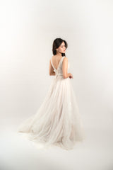 Deep Neckline Sleeveless Tulle Wedding Gown with Floral Embroidery