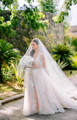 Deep Neckline Sleeveless Tulle Wedding Gown with Floral Embroidery